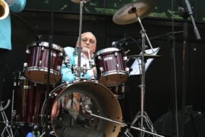 John McIntosh playing the drums