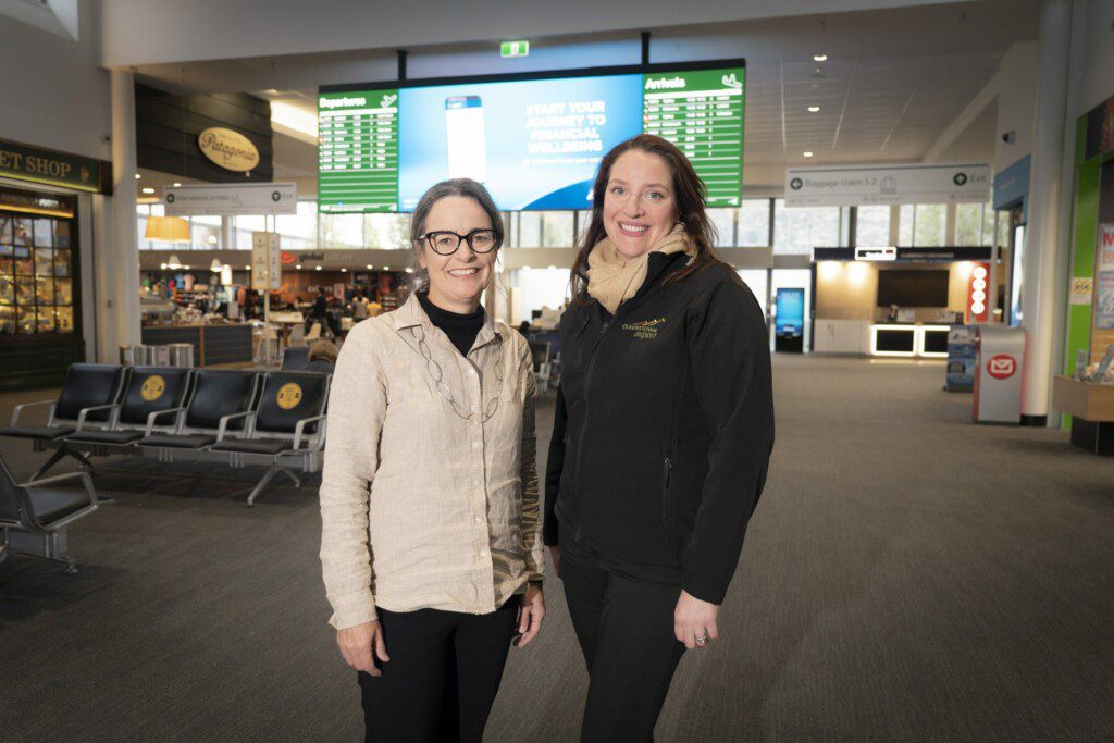 Megan Thomas from Life Unlimited (L) & Sara Irvine (R) in the main terminal at Queenstown Airport