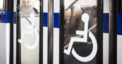 Bus door with accessible signage
